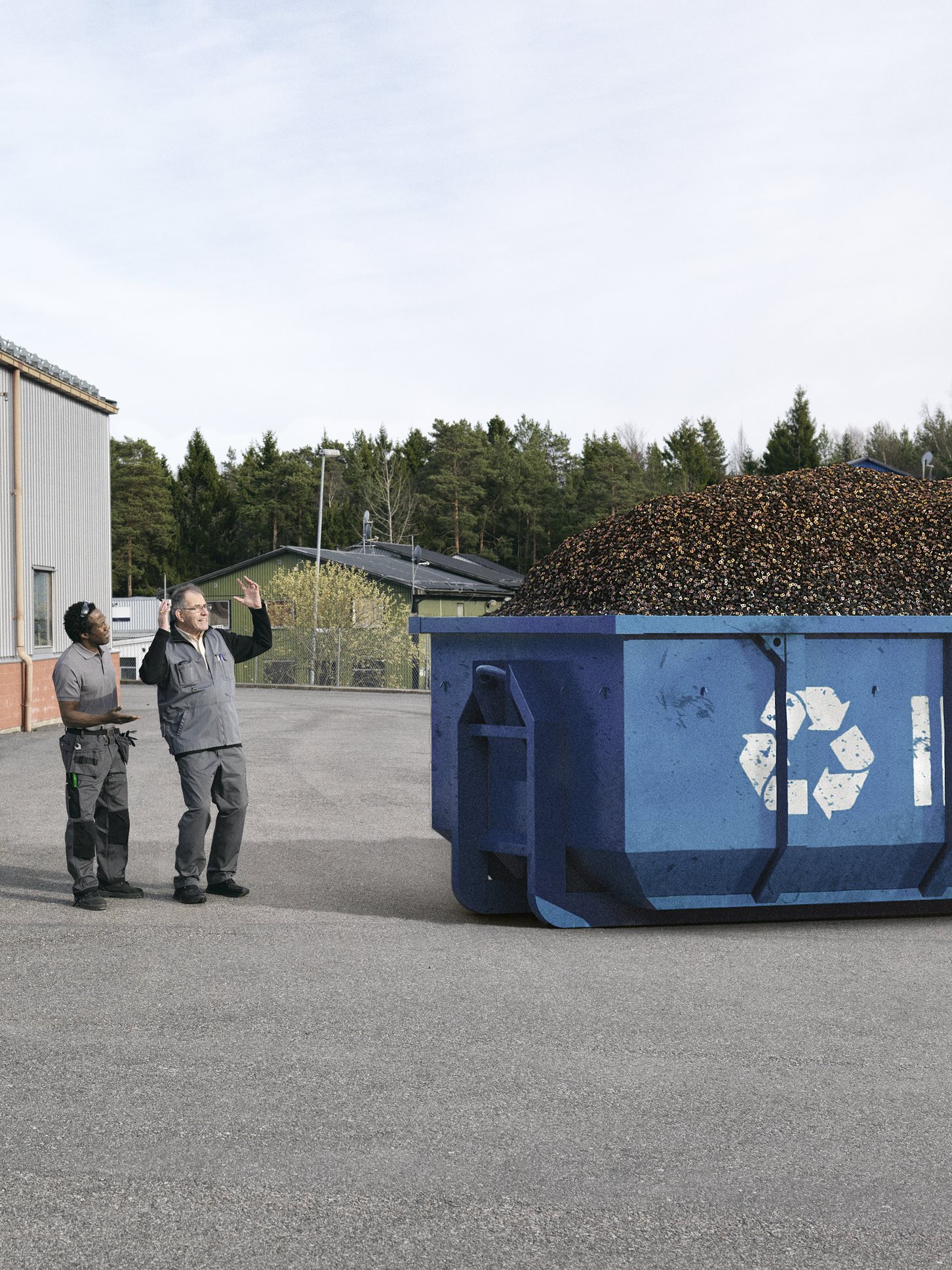 People_Standing_In_Front_Of_Recycling_Container.tif